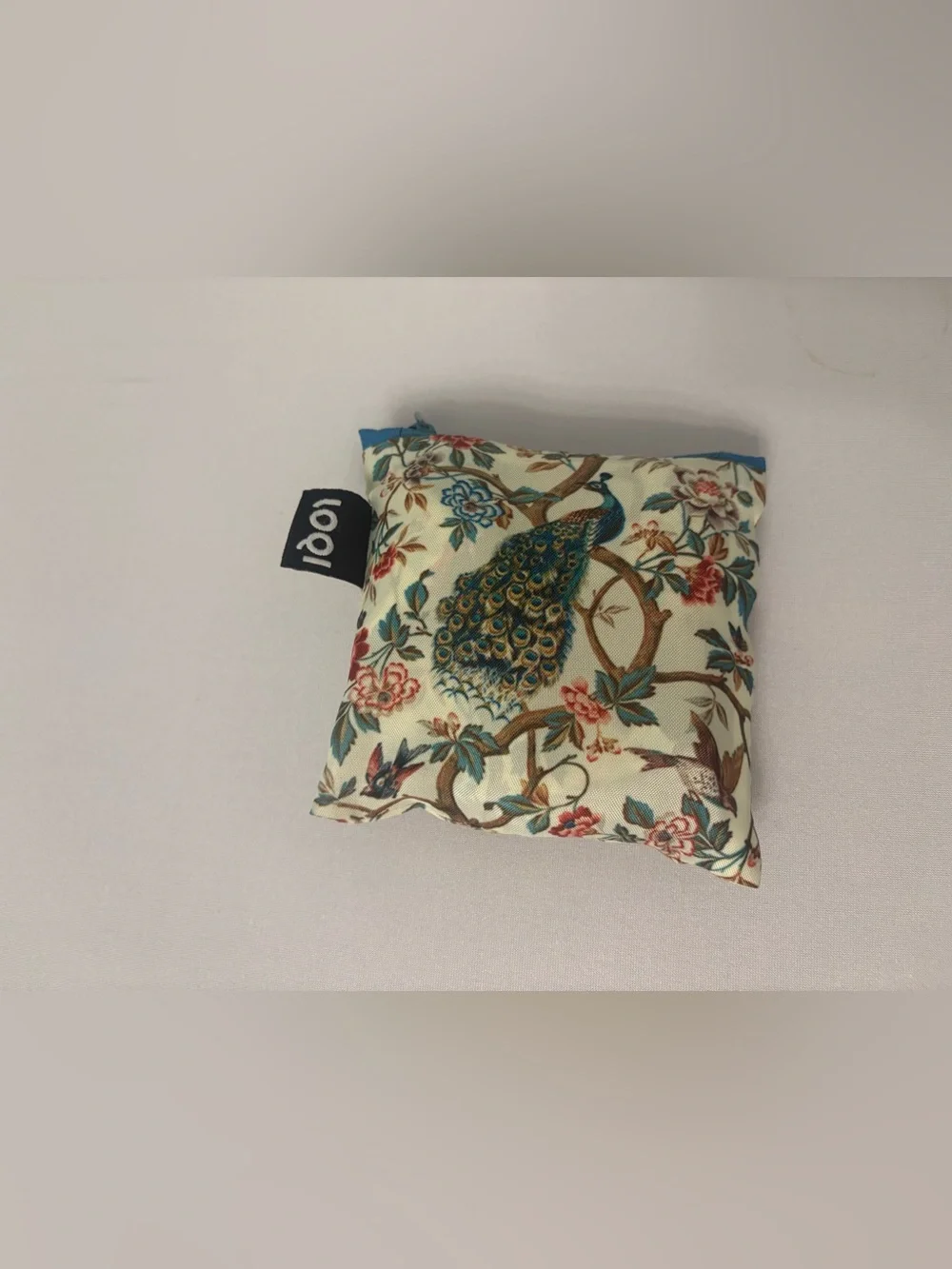 LOQI Peacock Floral Accent Pillow in Cream and Teal